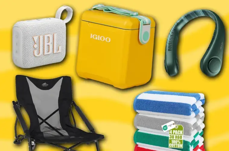 A collection of beach essentials including chairs, umbrellas, coolers, towels, sunglasses, and waterproof bags arranged on a sunny beach.