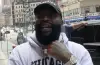 Rick Ross speaking at an event after expressing interest in purchasing an ownership stake in the Miami Dolphins NFL franchise.