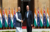 Prime Minister Narendra Modi arrives at Auckland Airport in New Zealand, where Prime Minister Chris Luxon personally welcomes him during his official diplomatic visit.