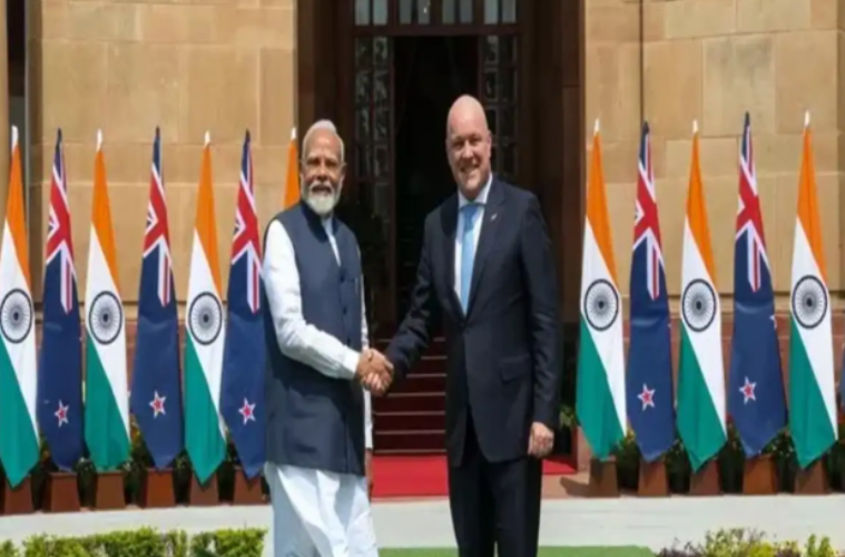 Prime Minister Narendra Modi arrives at Auckland Airport in New Zealand, where Prime Minister Chris Luxon personally welcomes him during his official diplomatic visit.