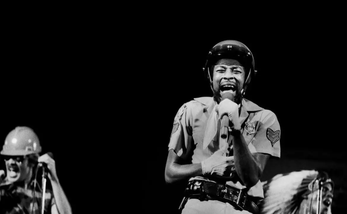 Victor Willis performs on stage with Village People during a live concert, celebrating the legendary singer's lasting impact on disco music after his death at age 74.
