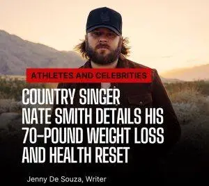 Country singer Nate Smith performing on stage after losing more than 70 pounds, showcasing improved confidence and stamina during a live concert.
