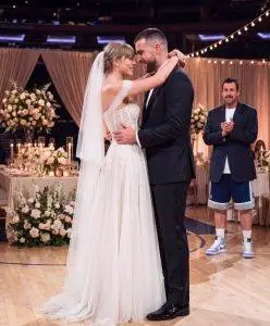 Taylor Swift and Travis Kelce attending a public event together as media attention surrounding their relationship continues.