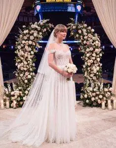 Taylor Swift and Travis Kelce attending a public event together as media attention surrounding their relationship continues.