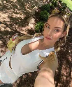Paige Spiranac posing in a patriotic Fourth of July-themed photo that sparked online discussion about AI-generated images before she clarified its production.