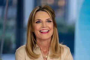 Savannah Guthrie wearing a yellow gingham dress during a live Today show broadcast after changing outfits during a commercial break.