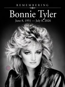 Bonnie Tyler performing on stage during a live concert, celebrating the legendary singer's decades-long career and lasting musical legacy.