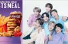 A McDonald's Happy Meal box displayed alongside colorful BT21 collectible character toys inspired by BTS, promoting the limited-time collaboration.