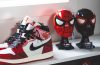 A collage of Tobey Maguire, Andrew Garfield, and Tom Holland as Peter Parker, highlighting the iconic sneakers worn across different Spider-Man film eras.