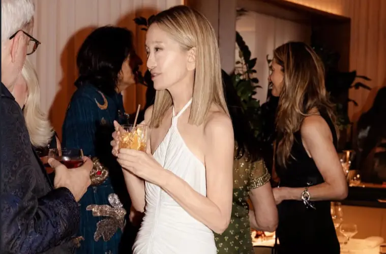 Vera Wang celebrates her 77th birthday in Paris, debuting a chic shoulder-length honey-blonde hairstyle while wearing an elegant white halter gown.