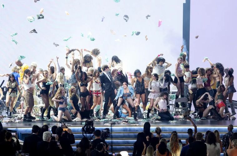 Bras and panties fly through the air as Charli XCX performs "Guess" during her Lollapalooza set.