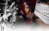 Charli XCX celebrates her 33rd birthday with a black birthday cake during a party with friends.