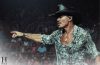 Tim McGraw performs onstage during his Cincinnati concert before taking a fall