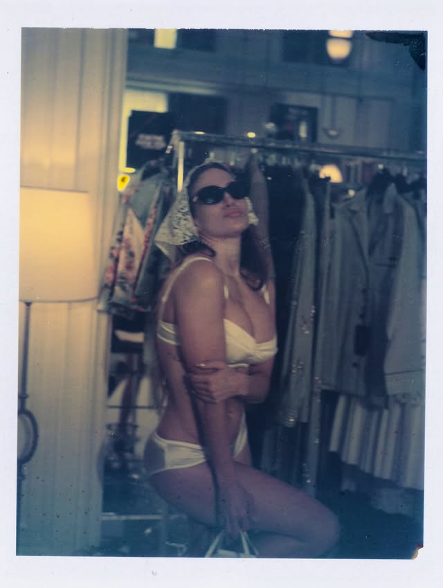 Jennifer Lopez poses in a white retro-inspired lingerie look with sunglasses and a headscarf in her latest Instagram photos.