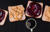 A selection of high-protein post-workout snacks including Greek yogurt, fruit, cottage cheese, jerky and a protein shake.