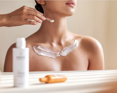 Korean skincare products designed for neck care, including creams, a treatment patch and a lightweight serum spray.