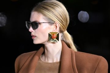 Oversized statement earrings featuring dramatic crystals, pearls, sculptural metal, and decorative motifs for fall 2026.