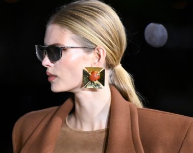 Oversized statement earrings featuring dramatic crystals, pearls, sculptural metal, and decorative motifs for fall 2026.