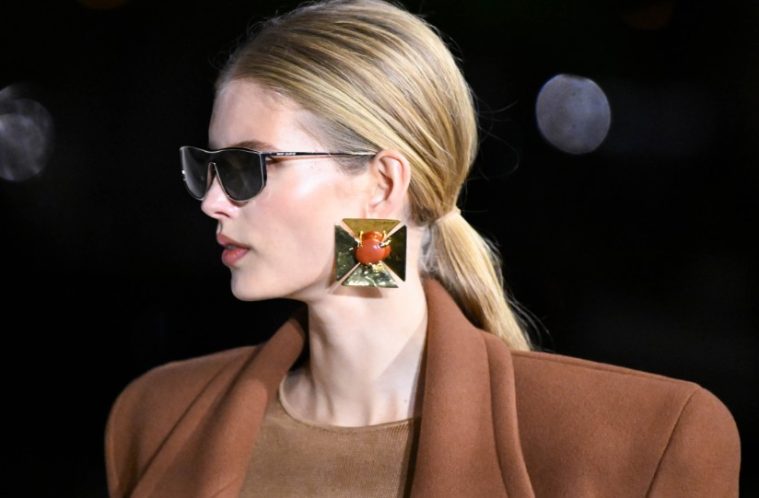 Oversized statement earrings featuring dramatic crystals, pearls, sculptural metal, and decorative motifs for fall 2026.
