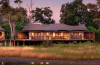 Luxury safari lodge overlooking the African wilderness with elegant accommodation and surrounding wildlife landscape.