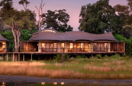 Luxury safari lodge overlooking the African wilderness with elegant accommodation and surrounding wildlife landscape.