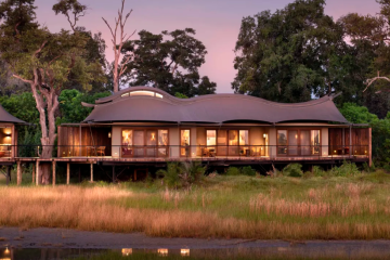 Luxury safari lodge overlooking the African wilderness with elegant accommodation and surrounding wildlife landscape.