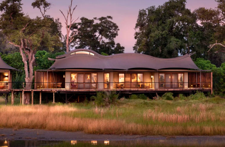 Luxury safari lodge overlooking the African wilderness with elegant accommodation and surrounding wildlife landscape.