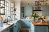 A bright kitchen refreshed with updated cabinets, lighting, open shelving, accessories, and colorful decorative details.