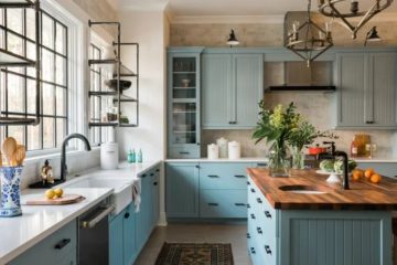 A bright kitchen refreshed with updated cabinets, lighting, open shelving, accessories, and colorful decorative details.