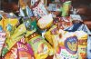 A colorful assortment of innovative savory snacks, sweet treats, chips, pretzels, nuts, fruit bars, and candies.