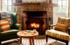 A cozy home interior styled for early fall with warm textiles, natural décor, seasonal accents, and framed artwork.