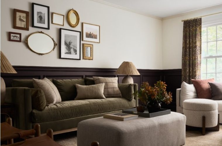 Vintage-inspired home interior featuring traditional décor, brass accents, artwork, curtains, and classic furniture.