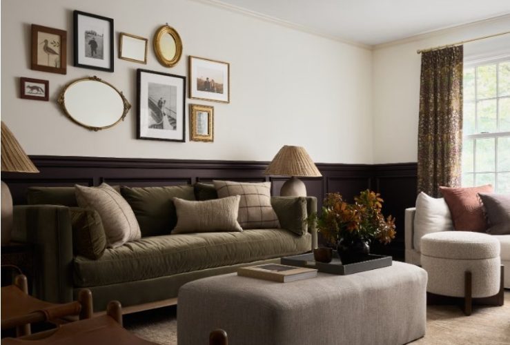 Vintage-inspired home interior featuring traditional décor, brass accents, artwork, curtains, and classic furniture.