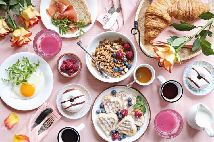 Healthy and less healthy foods alongside everyday lifestyle choices that can influence cholesterol and heart health.