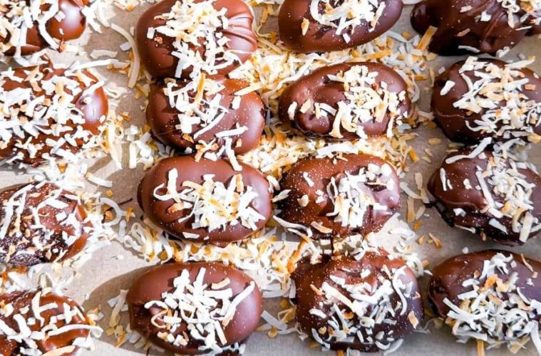 Whole Medjool dates and candy-style date snacks displayed as a naturally sweet alternative to traditional desserts.