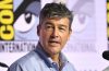 Kyle Chandler smiles while discussing how he secretly explored San Diego Comic-Con wearing a Stormtrooper helmet with his Lanterns co-star.