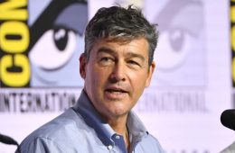 Kyle Chandler smiles while discussing how he secretly explored San Diego Comic-Con wearing a Stormtrooper helmet with his Lanterns co-star.