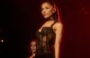 Ariana Grande attends a public event as fans discuss her recent Instagram activity and message about personal growth.