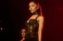 Ariana Grande attends a public event as fans discuss her recent Instagram activity and message about personal growth.