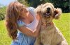 Ryan Gosling and Eva Mendes with their newly adopted rescue dog, celebrating the newest addition to their family.