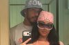 Kim Kardashian and Lewis Hamilton embrace during a tropical vacation while Kardashian’s family enjoys the getaway.