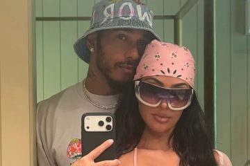 Kim Kardashian and Lewis Hamilton embrace during a tropical vacation while Kardashian’s family enjoys the getaway.