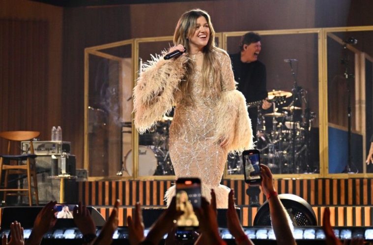 Kelly Clarkson performs during her Las Vegas residency after experiencing a humorous wardrobe malfunction onstage.
