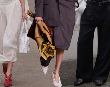 A selection of woven loafers in leather, raffia and neutral finishes styled for late-summer and early-fall outfits.