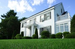 Healthy green lawn being watered efficiently during hot summer weather.