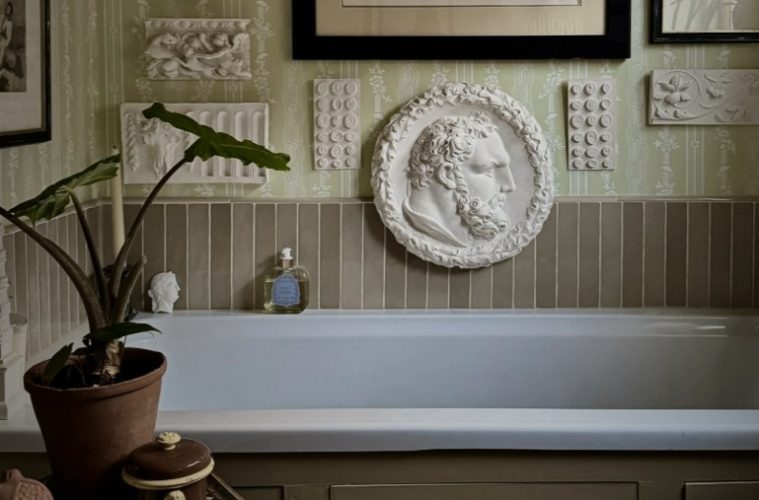 Modern interior featuring Ancient Greek-inspired design elements, natural stone, sculptural decor, and classical geometric details.