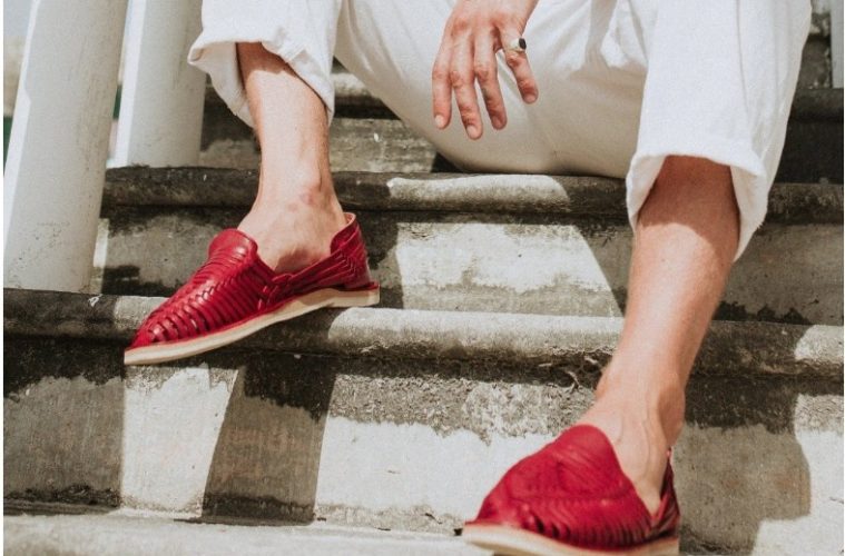 Stylish woven huarache sandals paired with a relaxed summer travel outfit.