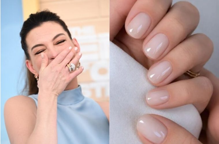Anne Hathaway showcases short, glossy coconut water nails with a sheer creamy finish and subtle shine.