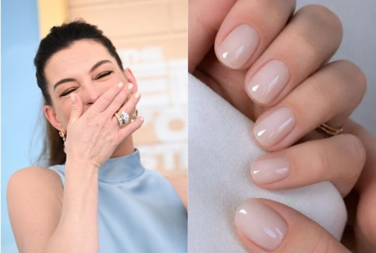 Anne Hathaway showcases short, glossy coconut water nails with a sheer creamy finish and subtle shine.