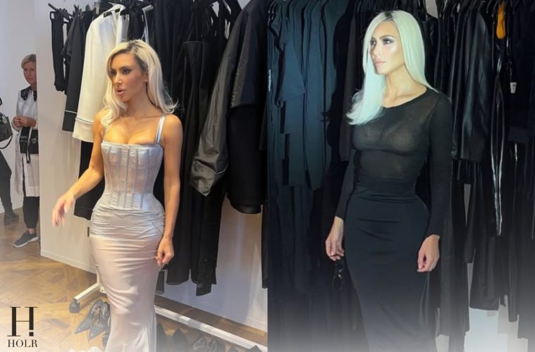 Kim Kardashian posing in a dramatic fashion look from her fitting archives